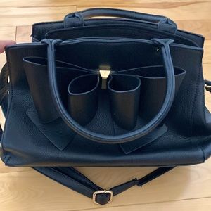 black purse with bow